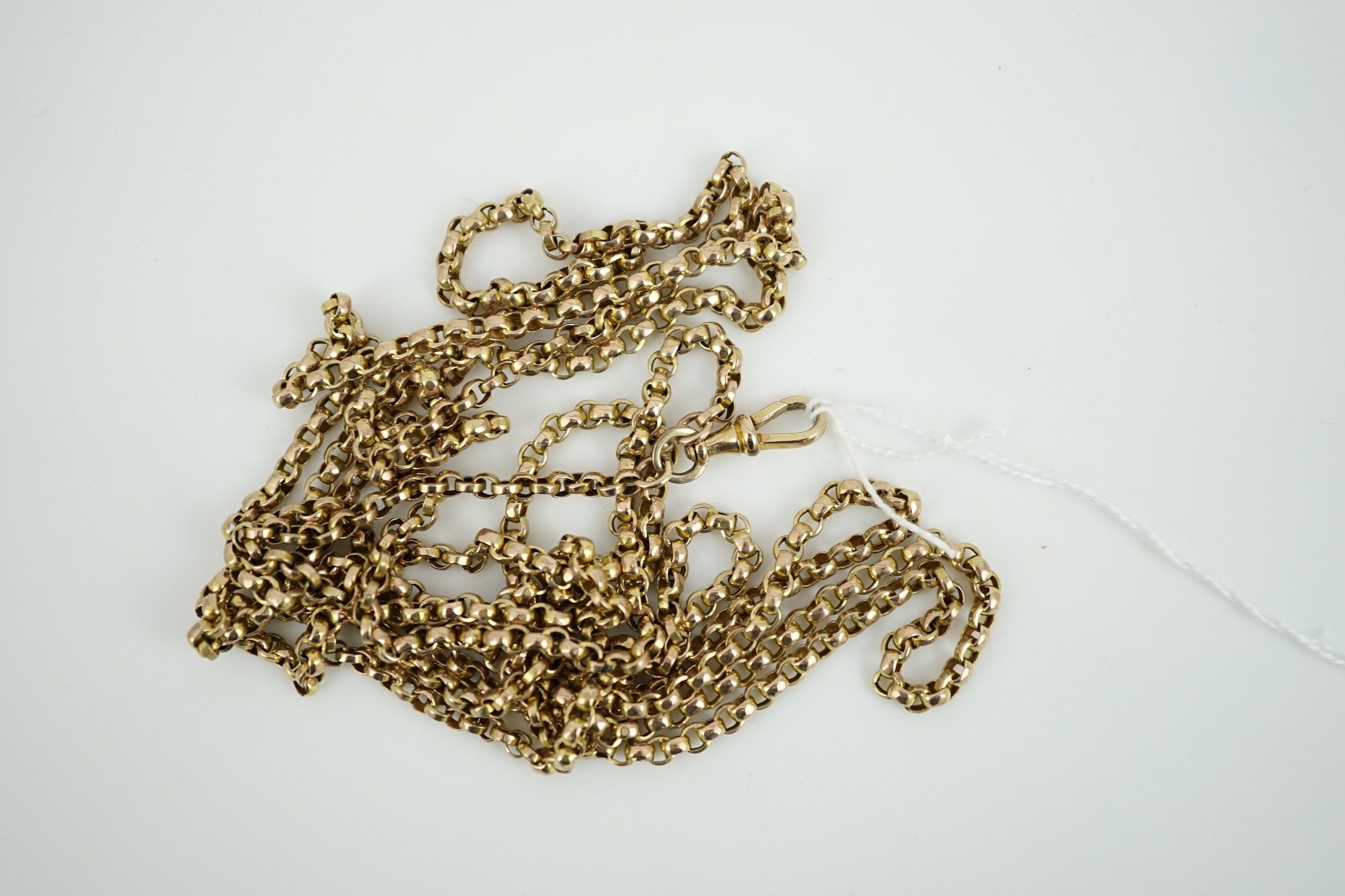 An early 20th century yellow metal guard chain, 169cm, 38 grams.